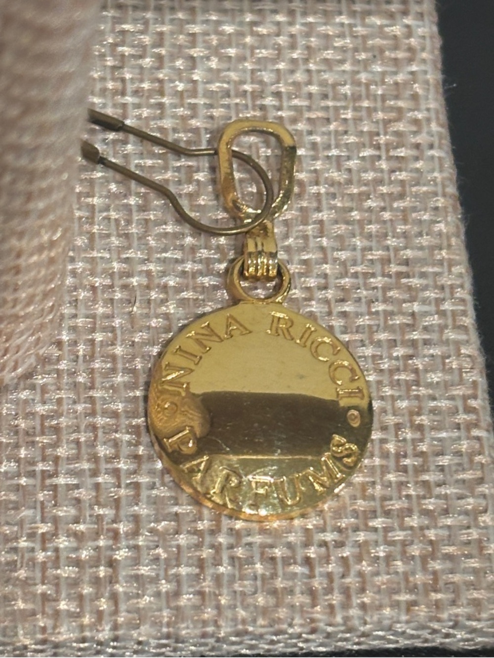 Nina Ricci Gold Logo Medallion Drop Earrings